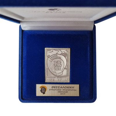 Collectible case containing a silver-plated brass postage stamp